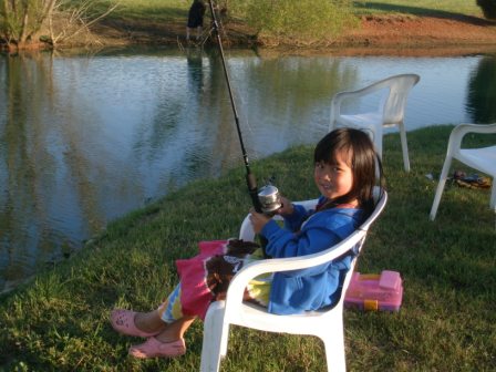 Kasen fishing in our pond